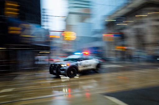 Blurred motion : Toronto police car in emergency in the city of Toronto