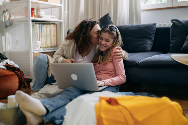 istock mother and daughter at home 1458680412