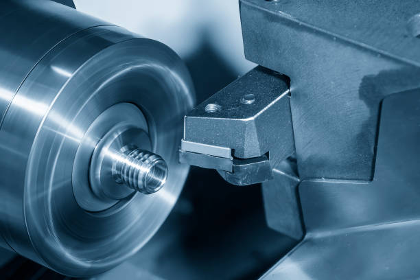 istock The multi-tasking CNC lathe machine  thread cutting the metal pipe parts. 1458681291