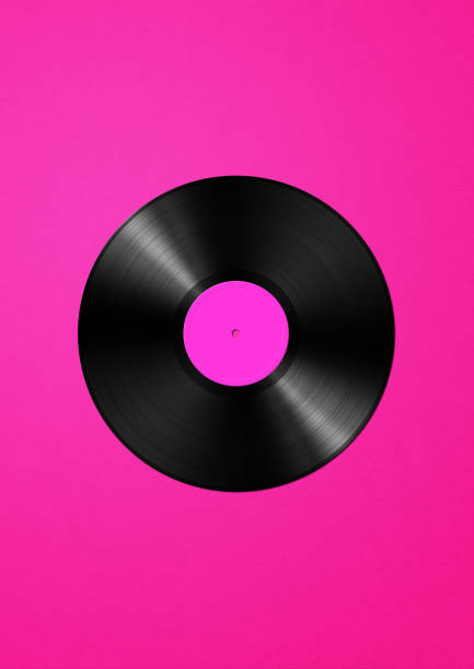 istock Vinyl record isolated on pink background 1458681570
