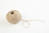 Ball of Jute twine on white background