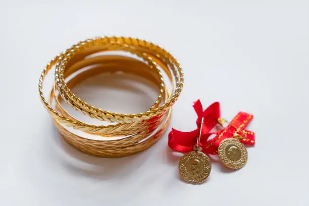 Gold Bracelets and GoldCoins