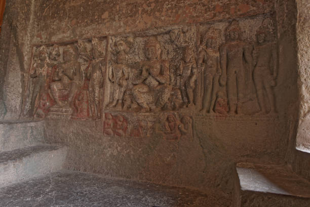 istock Bas relief rock cut panel in Ajanta Caves 1458685932
