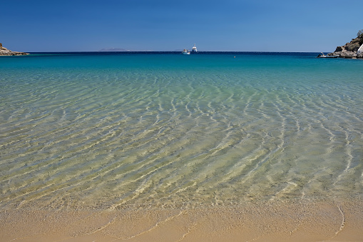 The breathtaking turquoise sandy beach of Kolitsani View in Ios Cyclades Greece