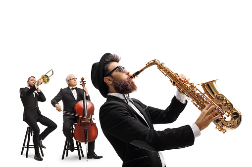 Man playing a sax and other artists playing a trombone and a cello isolated on white background