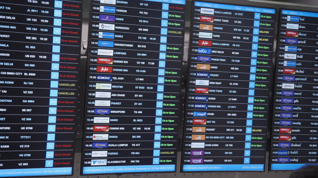 Airline departure board at the airport