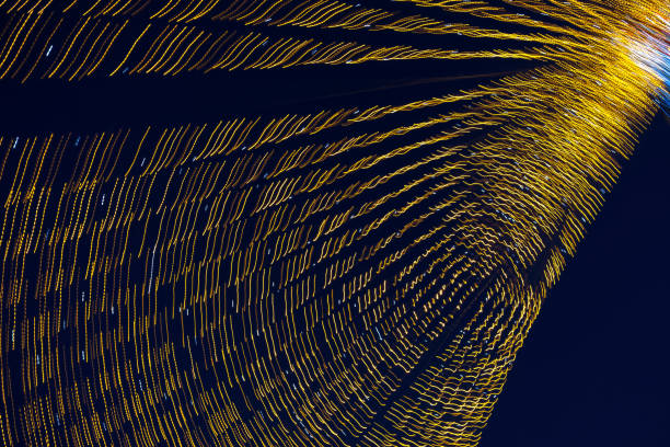 istock Abstraction blurred movement lights garlands 1458695919