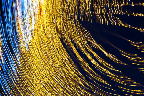 istock Abstraction blurred movement lights garlands 1458696060