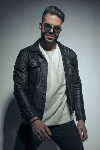 istock casual man posing with a sexy stance 1458700764