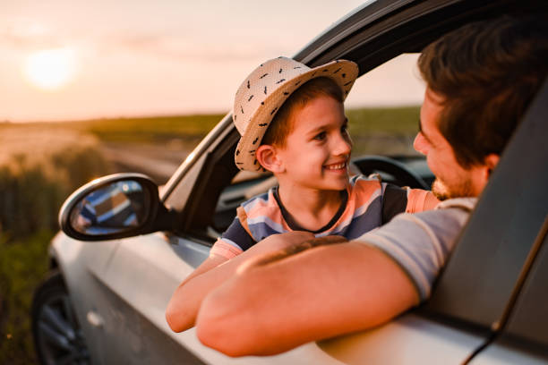 istock Beautiful father and son enjoying on a road trip 1458701301
