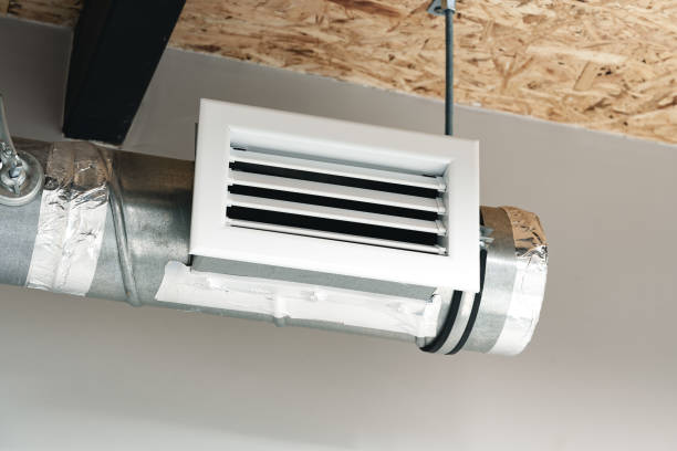 istock Silver ventilation pipes hanging from the ceiling inside the building 1458702343