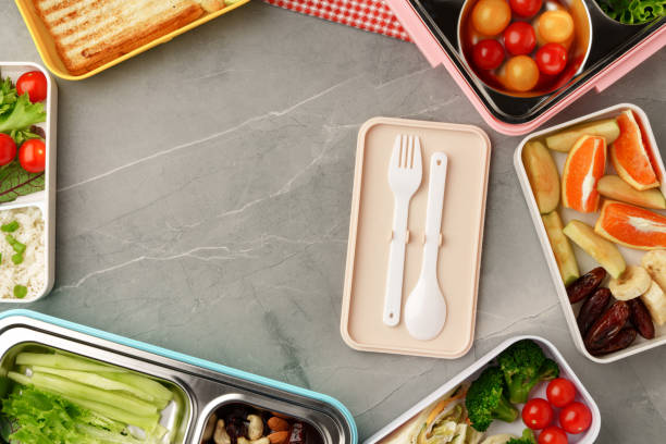 istock Containers with healthy food on gray background top view. 1458706084