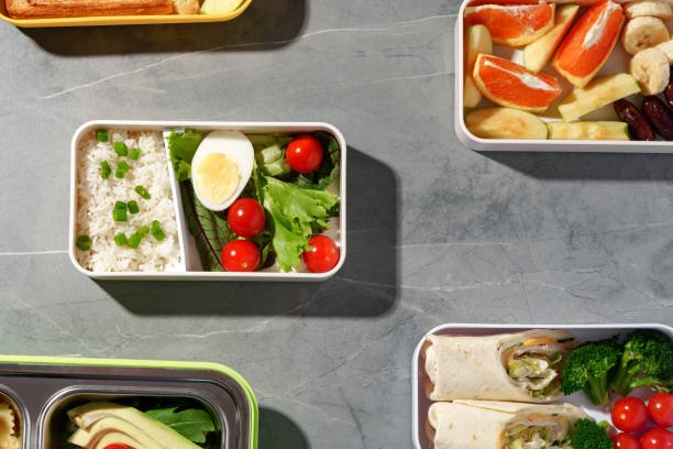 istock Containers with healthy food on gray background top view. 1458706801