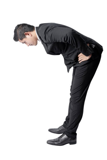 istock Asian businessman standing and looking down 1458707297