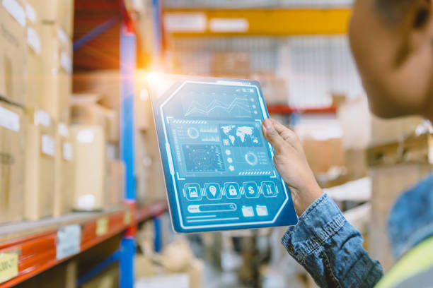 istock Inventory staff hand holding infographic Tablet for Advanced Digital Technology Warehouse Management concept. 1458711191