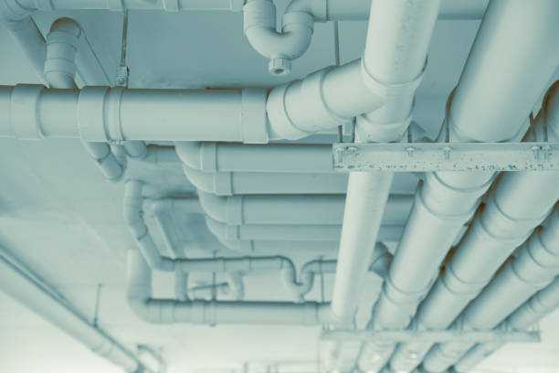 istock Water pipe. Drain Pipe watering system, Water tube construction engineering in modern building. 1458711302