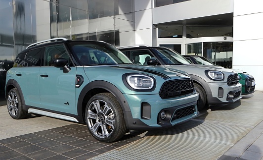 Udine, Italy. January 21, 2023. Brand new Mini cooper S cars on display outside the official dealer.