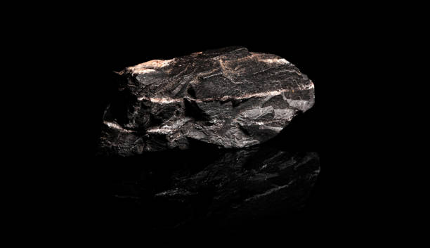 istock Macro Close up image of raw material Manganese Ore rock isolated 1458713335