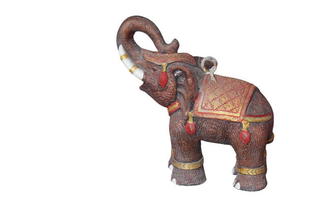 istock old brown and gold statue elephant standing on white background, animal, object, decor, copy space 1458713874