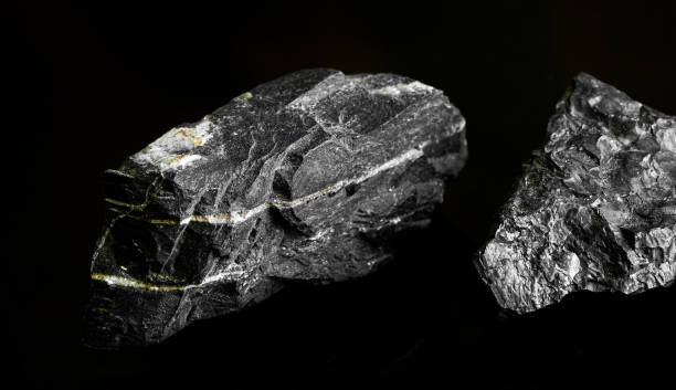 istock Macro Close up image of raw material Manganese Ore rock isolated 1458714568