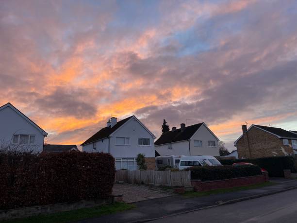 istock Stunning sunrise sky above the town 1458716635