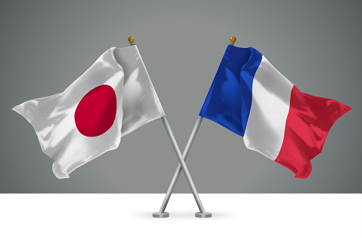 3D illustration of Two Wavy Crossed Flags of Japan and France, Sign of Japanese and French Relationships