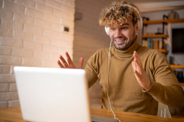 istock Young fashionable man working at home 1458717449