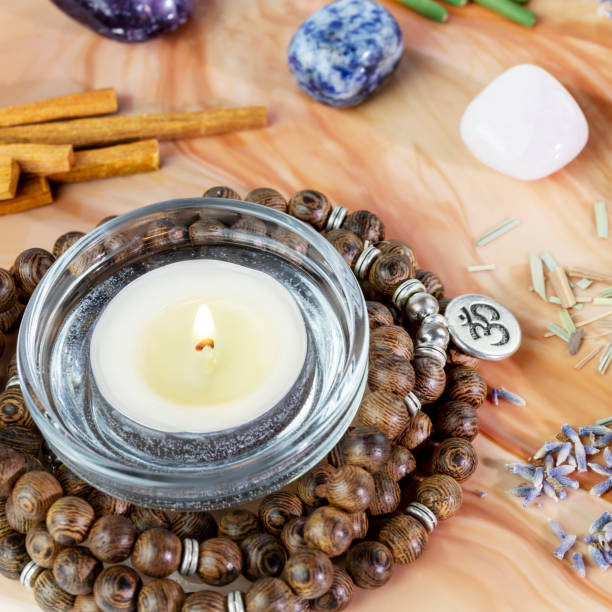 istock Healing composition with rosary beads, chakra stones and candle 1458723000