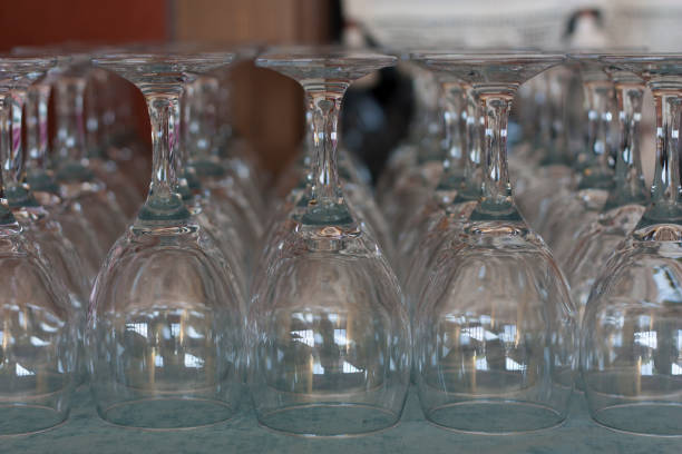 istock Empty glasses in restaurant. Cutlery on the table in a restaurant table setting photo 1458724225