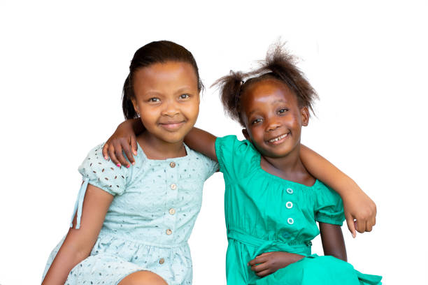 istock Studio portrait of two african girlfriends 1458726766