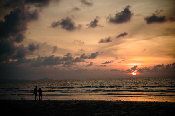 istock Couple chilling to view sunset 1458729094