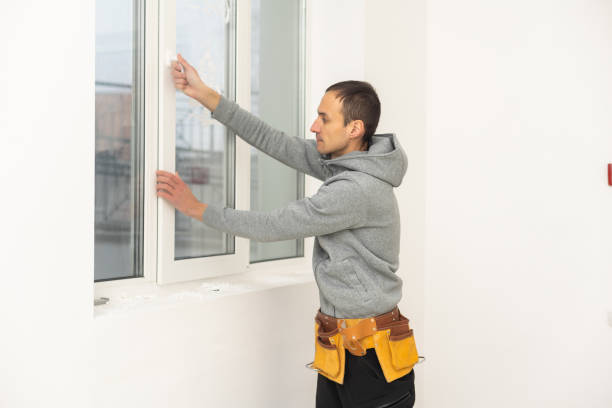 istock The worker installing and checking window in the house 1458730587