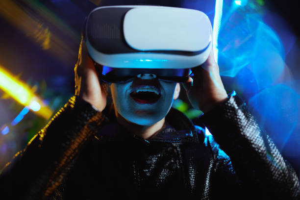istock smiling modern woman in metaverse in vr goggles 1458736882