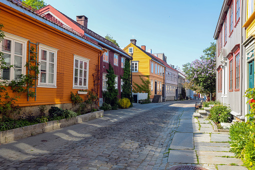 Typical red swedish wooden houses with boats in the city of Karlskrona
