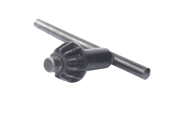 istock wrench for clamping a drill in a drill, chuck key isolated from background 1458743259