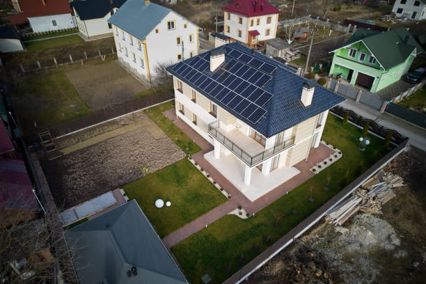 istock Residential houses with solar panel system in new district. 1458743893