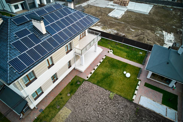 istock Modern residential house with solar panel system on roof. 1458744383