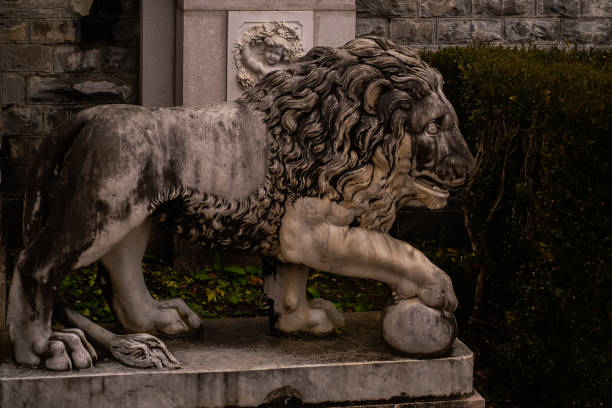 istock ancient stone statues in the castle in the evening 1458745122
