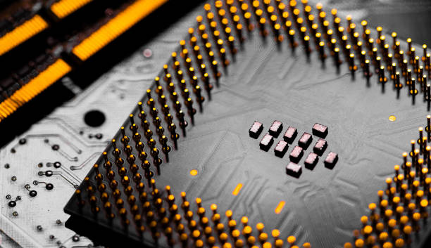 close up of ram memory and pins on main cpu pc processor circuit - connection block order green colors imagens e fotografias de stock