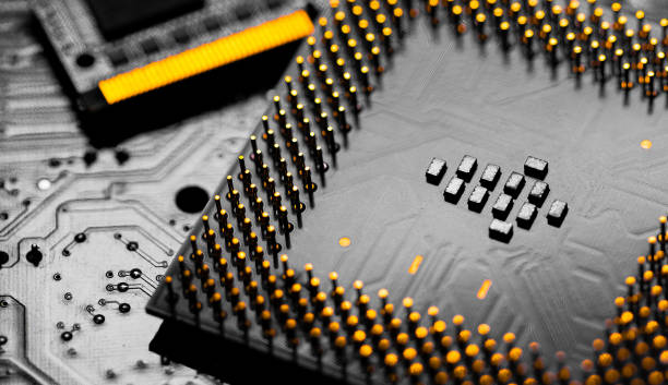 close up of ram memory and pins on main cpu pc processor circuit - connection block order green colors imagens e fotografias de stock