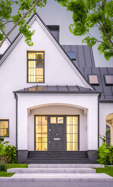 istock 3d rendering of white and black modern Tudor house in evening 1458749186