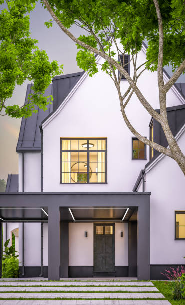 istock 3d rendering of white and black modern Tudor house in evening 1458749191