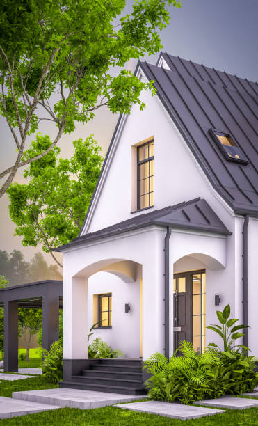 istock 3d rendering of white and black modern Tudor house in evening 1458749210