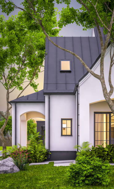 istock 3d rendering of white and black modern Tudor house in evening 1458749244
