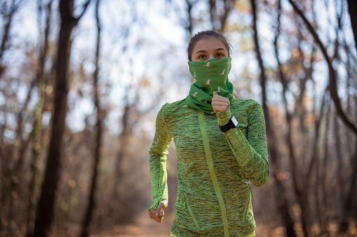 Woman jogging in the forest