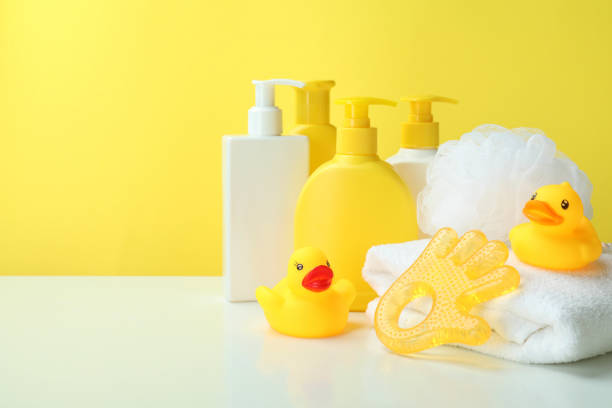 istock Different baby hygiene accessories against yellow background 1458753006