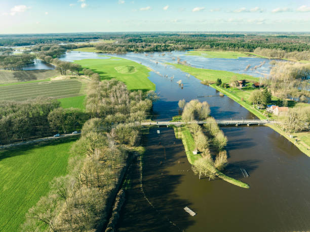istock Vecht river high water level flooding at the Junne weir drone view 1458755075