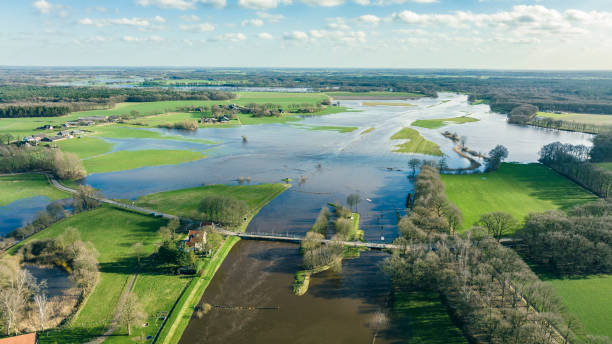 istock Vecht river high water level flooding at the Junne weir drone view 1458755606
