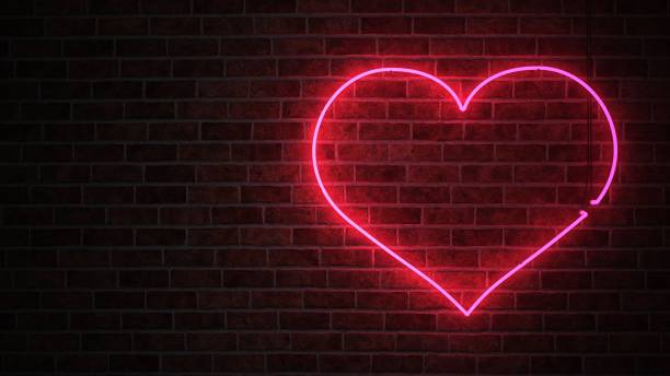 istock Heart Neon Sign Brick Wall 1458756088