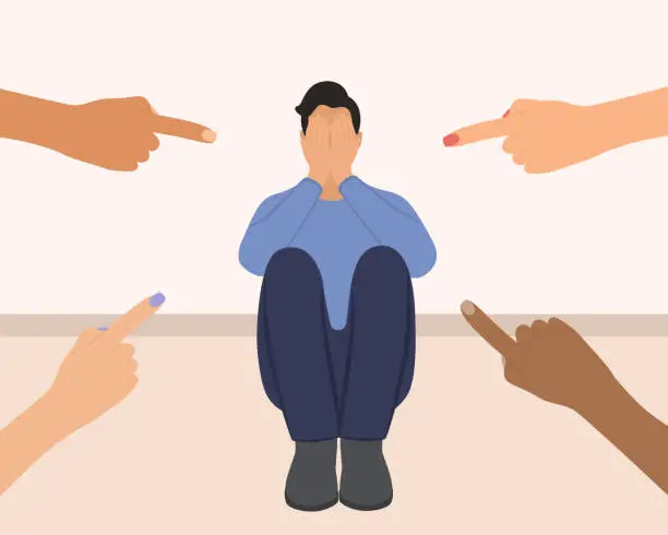 Vector illustration of Depressed Man Surrounded By Hands With Index Fingers Pointing At Him. Sad Man Covering His Face With His Hands. Victim Blaming And Social Judgement Concept